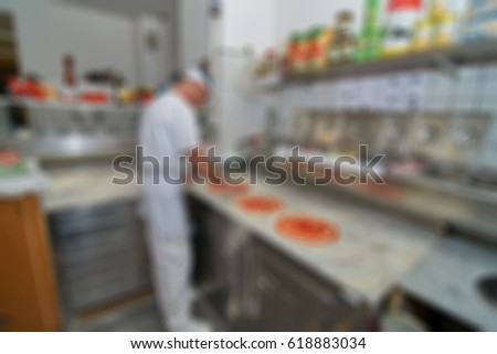 Picture blurred for background abstract and can be illustration to  how to prepare pizza