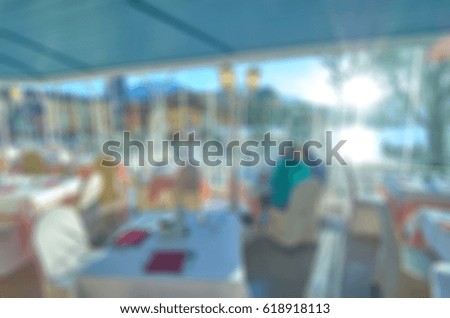 Picture blurred for background abstract and can be illustration Blurred background of restaurant with people in a modern hotel