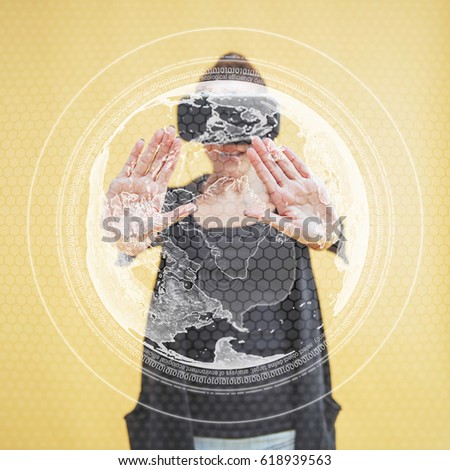 Happy woman in the studio gets the experience of using VR-glasses virtual reality headset. Innovative technologies. The concept of security. Holding a glowing planet Earth.