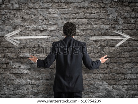 Businessman in front of a choice