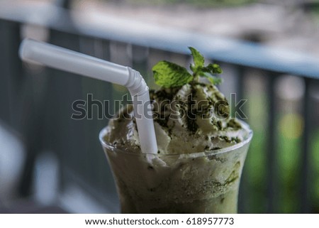 Iced green tea with whipped cream, Thailand.