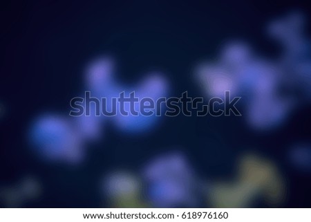 Picture blurred for background abstract Underwater photo of a group of jellyfish