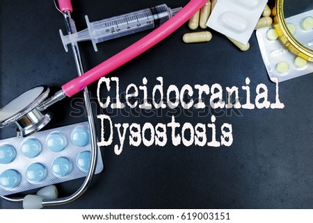 Cleidocranial Dysostosis word, medical term word with medical concepts in blackboard and medical equipment