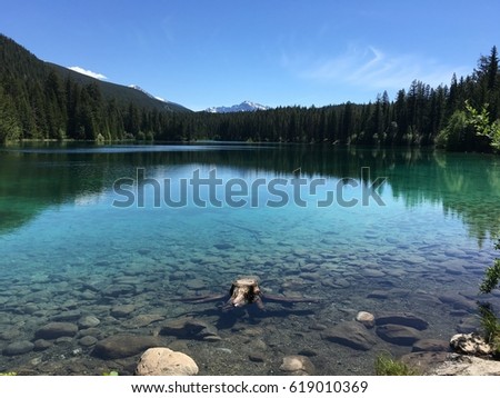 Explanation : A picture taken during the bicycle trip in Canada
Title : The Rocky mountain in May
Caption : The Fifth Lake of Rocky Mountain