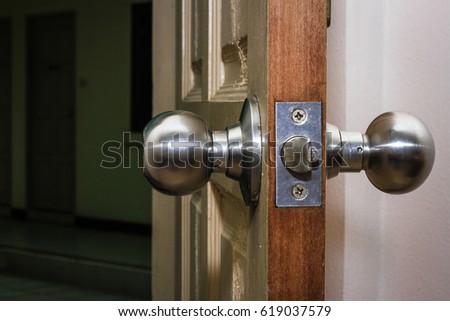 door knob on a wooden door