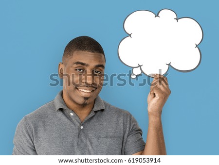 African descent man is holding speech bubble