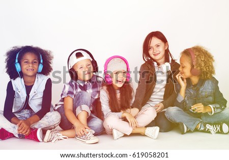 Group of children sitting and hanging out