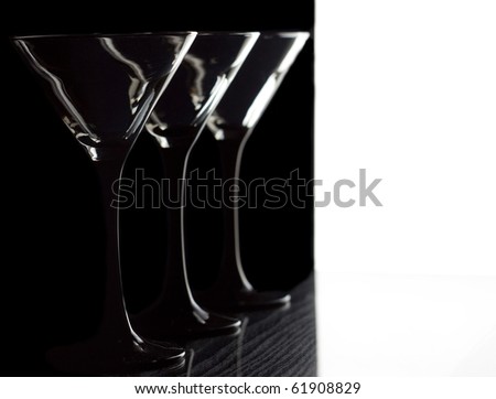 Three Martini glass on a black and white background