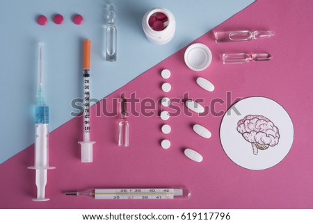 Different medicine stuff like pills, capsules, ampulla,syringe, needle,saline solution, Injection.
Hospital concept. Hand drawn Brain icon 