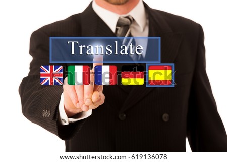 businessman pressing on a virtual button translate  to activate translate app with national flags of great britan italy france germany and spain  for english italian french german spanish language 