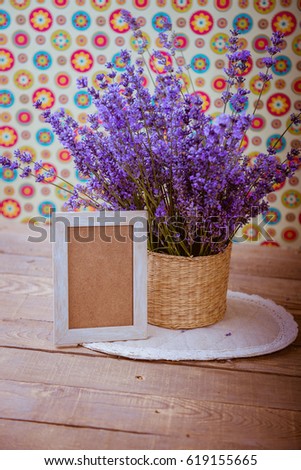 Blank photo frame and bouquet of lavender