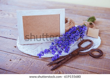 Blank photo frame and bouquet of lavender