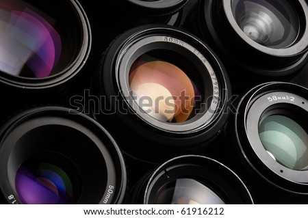 Group of colorful camera lenses Royalty-Free Stock Photo #61916212