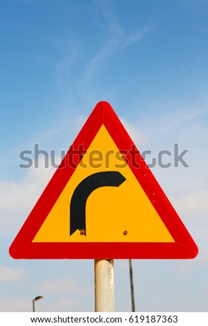 road signal attention of the curve in the sky like abstract background
