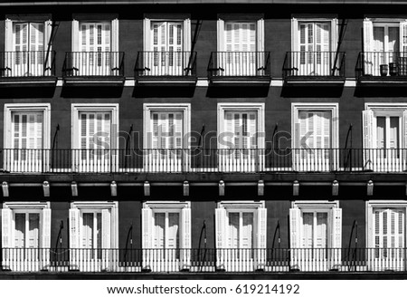 Madrid (Spain): facade of historic palace in Plaza Mayor, the main square of the city. Black and white