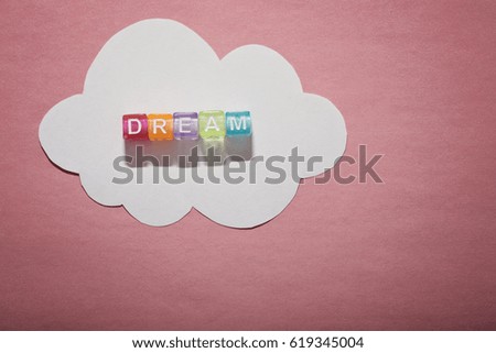 DREAM, by colorful alphabet beads with white paper cloud