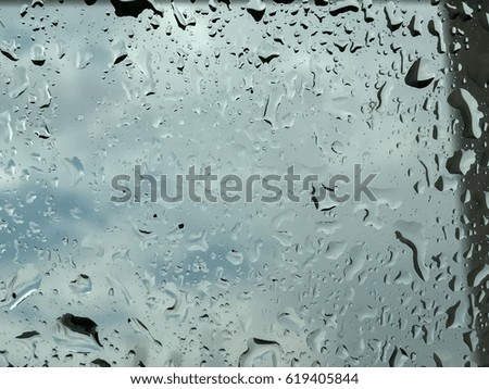 water drop on glass in raining day