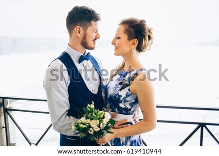 wedding in interior. Newlyweds kissing. Wedding photo shoot