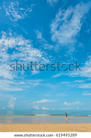 minimalist style image of people at the sea on day time for background usage