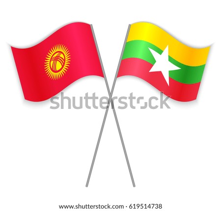 Kirgiz and Burmese crossed flags. Kyrgyzstan combined with Burma isolated on white. Language learning, international business or travel concept.