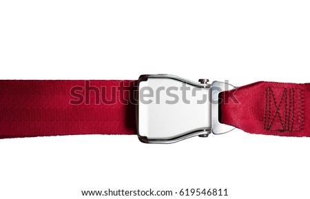 red seat belt in airplane isolated on white background . Royalty-Free Stock Photo #619546811