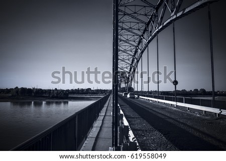 perspective view of the old steel bridge in lombardy region in north italy
