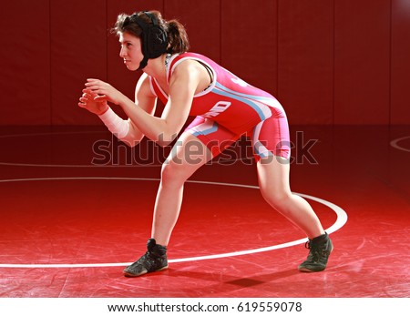 High School age female wrestler in her stance