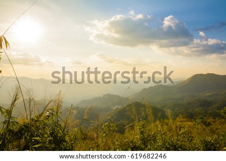 Beautiful mountain landscape with sunset and blue sky