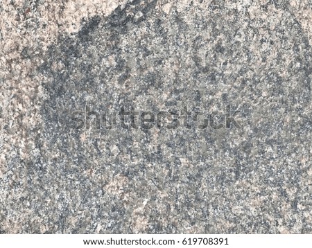 Surface of a block of granite rock