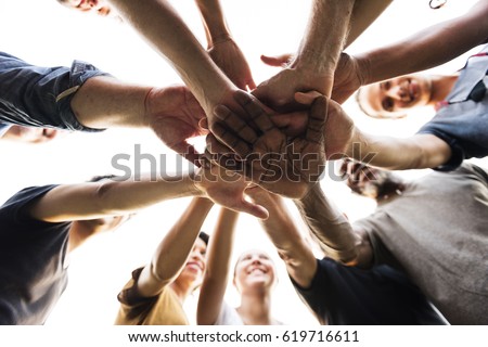 Diverse Group of People Hands Together Partnership Teamwork Royalty-Free Stock Photo #619716611