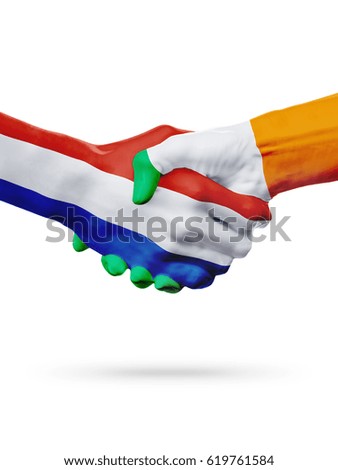 Flags Netherlands, Ireland countries, handshake cooperation, partnership, friendship or sports team competition concept, isolated on white