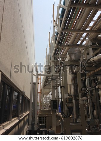 The pipe flow of cooling water at factory.