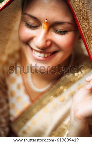 European bride wearing indian wedding sari