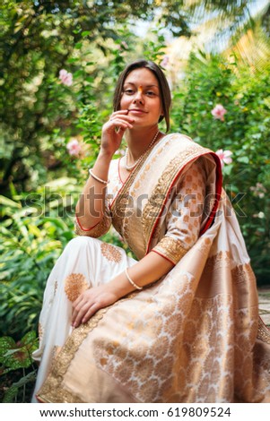 European bride wearing indian wedding sari