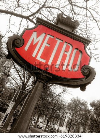 very old metro sign in Paris in France