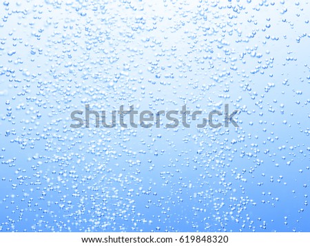 Air bubbles of the soda Royalty-Free Stock Photo #619848320
