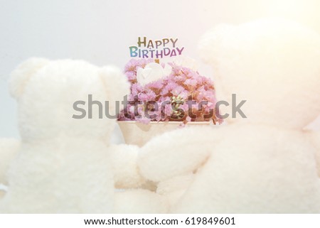 teddy bear with flowers and birthday with sunrise