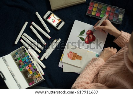 artist using artistic markers. realism painting