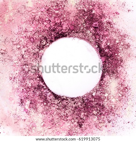 Traces of pink and purple makeup powder forming a frame. A square template for a makeup artist's business card or flyer design, with copy space. Toned image