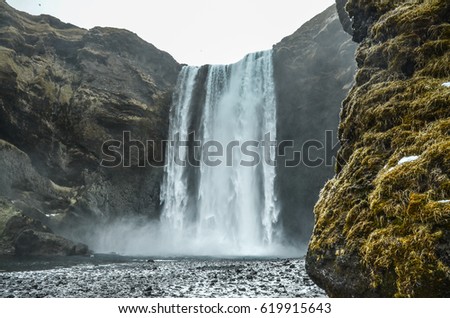 Skogafoss waterfall in south Iceland during the cold of winter.