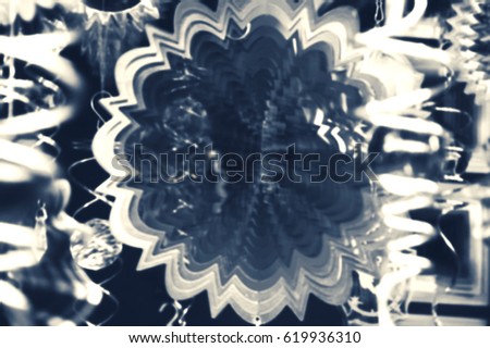 Blurred toned photo of optical illusion shapes. Abstract background. 