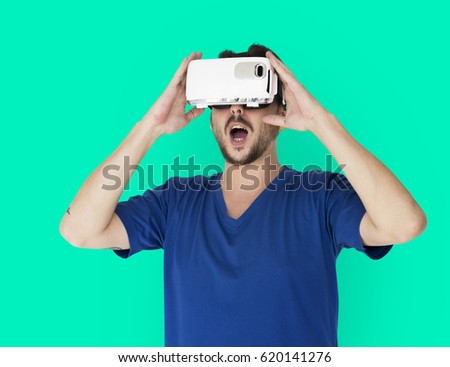A man using a visualising reality gadget