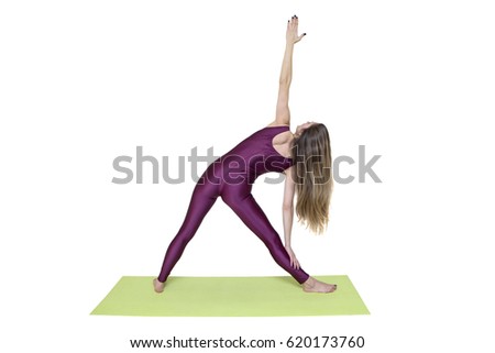 Young woman doing stretching exercises after training