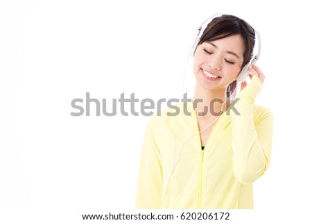 portrait of sporty asian woman isolated on white background