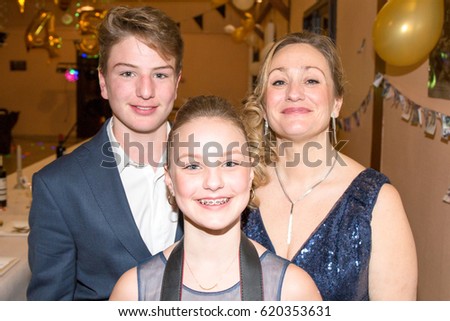 mother with her two teenage children a boy and a girl