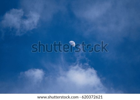 Blue sky color clouds and moon.                               
