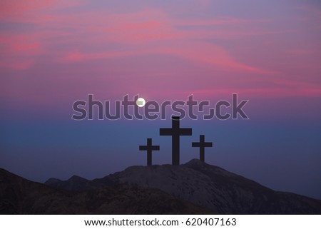 Crosses on the hill over sunset background.Religious concept of crucifixion