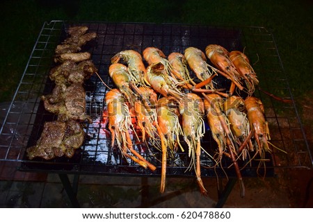 Seafood barbecue on the beach party