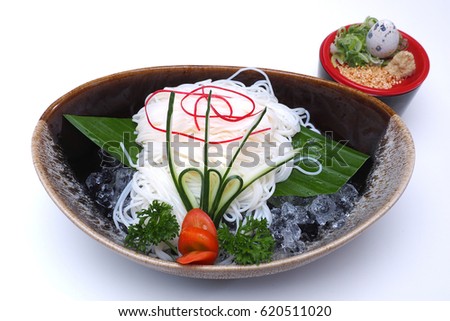 Japanese chilled noodles or Hiyashi Somen served with dipping sauce , isolated on white background (with Clipping Path)