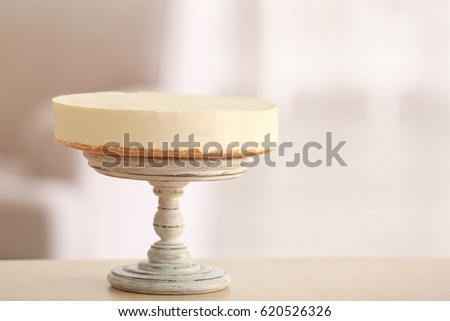 Delicious cheesecake on stand